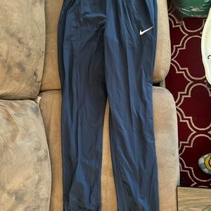 Nike Navy Track Pants with White Swoosh Logo